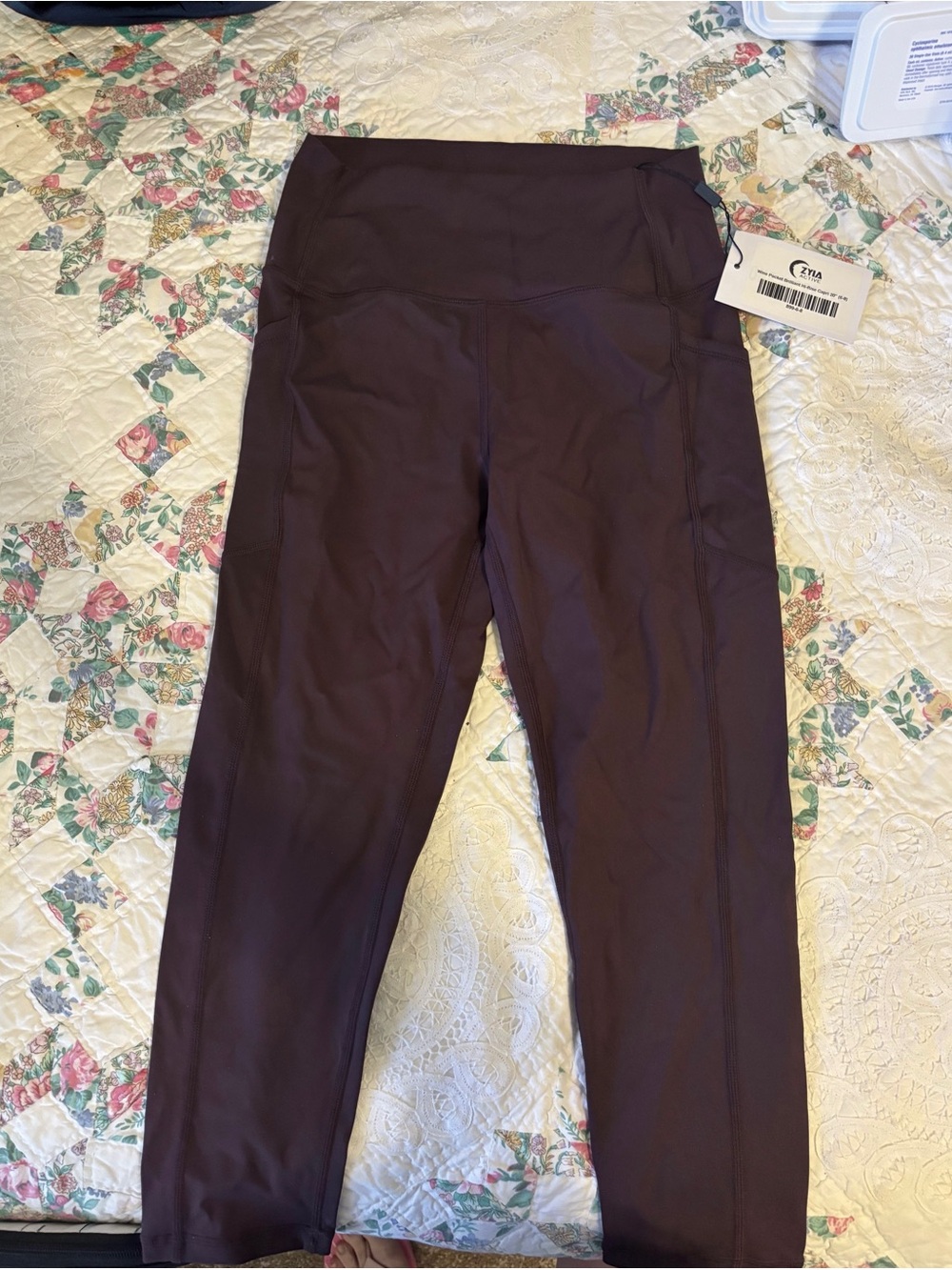 NWT Zyia Wine pocket brilliant Hi-rise capri 20” .